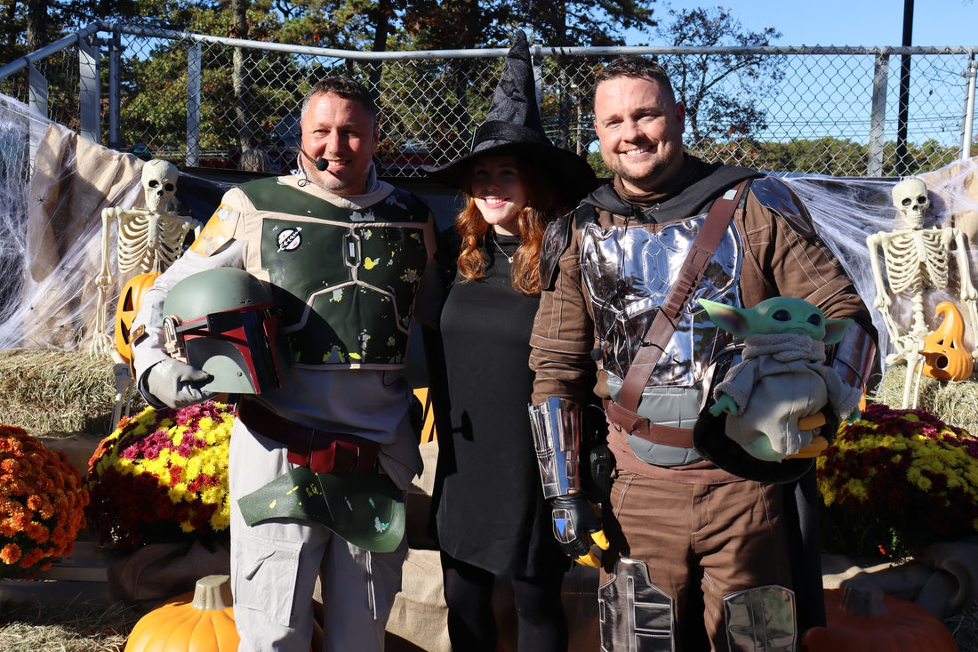 Three grown-ups in Star Wars and witch costumes at Halloweenpalooza